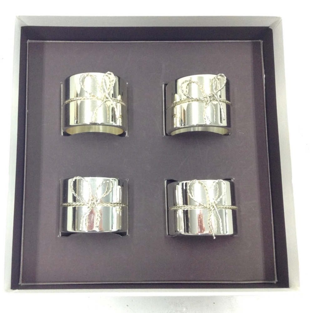 Vera Wang Love Knots Set of 4 Silver Napkin Rings with Bow Design. Brand NIB